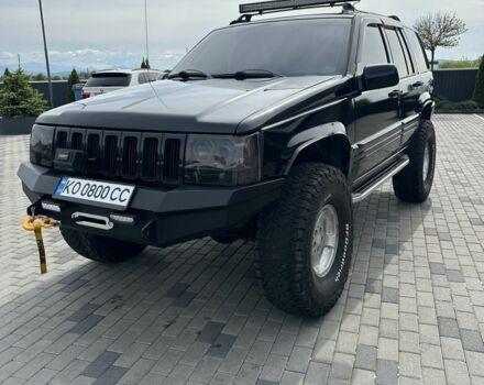 Черный Джип Гранд Чероки, объемом двигателя 5.2 л и пробегом 300 тыс. км за 7500 $, фото 1 на Automoto.ua