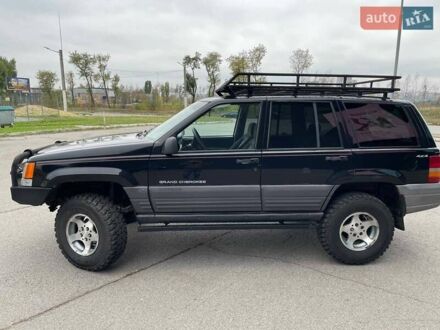 Чорний Джип Grand Cherokee, об'ємом двигуна 4 л та пробігом 220 тис. км за 7500 $, фото 1 на Automoto.ua