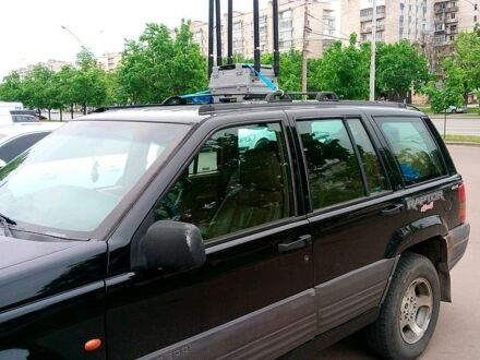 Черный Джип Гранд Чероки, объемом двигателя 2.5 л и пробегом 111 тыс. км за 3200 $, фото 1 на Automoto.ua