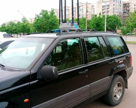 Черный Джип Гранд Чероки, объемом двигателя 2.5 л и пробегом 111 тыс. км за 3200 $, фото 1 на Automoto.ua