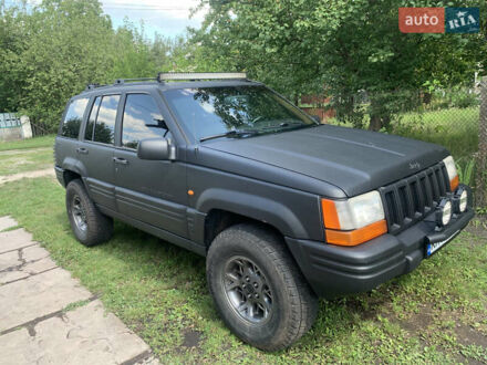 Чорний Джип Grand Cherokee, об'ємом двигуна 4 л та пробігом 399 тис. км за 6500 $, фото 1 на Automoto.ua