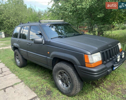 Черный Джип Гранд Чероки, объемом двигателя 4 л и пробегом 399 тыс. км за 6500 $, фото 1 на Automoto.ua