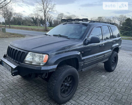 Чорний Джип Grand Cherokee, об'ємом двигуна 4.7 л та пробігом 350 тис. км за 6458 $, фото 1 на Automoto.ua