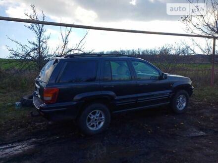 Чорний Джип Grand Cherokee, об'ємом двигуна 3.12 л та пробігом 300 тис. км за 8000 $, фото 1 на Automoto.ua