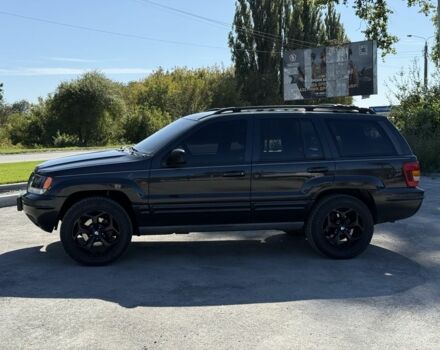 Чорний Джип Grand Cherokee, об'ємом двигуна 4.7 л та пробігом 350 тис. км за 11000 $, фото 1 на Automoto.ua
