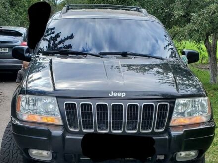 Чорний Джип Grand Cherokee, об'ємом двигуна 4 л та пробігом 379 тис. км за 8400 $, фото 1 на Automoto.ua