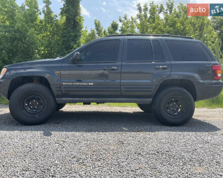 Чорний Джип Grand Cherokee, об'ємом двигуна 3.12 л та пробігом 339 тис. км за 7000 $, фото 1 на Automoto.ua