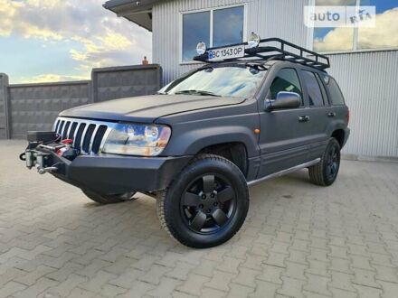 Чорний Джип Grand Cherokee, об'ємом двигуна 3.12 л та пробігом 163 тис. км за 9500 $, фото 1 на Automoto.ua