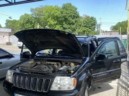 Чорний Джип Grand Cherokee, об'ємом двигуна 3.12 л та пробігом 250 тис. км за 6800 $, фото 1 на Automoto.ua