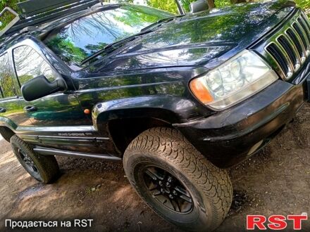 Джип Гранд Чероки 2002 в Краматорске на Automoto.ua Черный Джип Гранд Чероки, объемом двигателя 3.2 л и пробегом 302 тыс. км за 5500 $, фото 1 на Automoto.ua