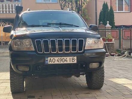 Джип Гранд Чероки 2002 в Тячеве на Automoto.ua Черный Джип Гранд Чероки, объемом двигателя 2.7 л и пробегом 400 тыс. км за 8000 $, фото 1 на Automoto.ua