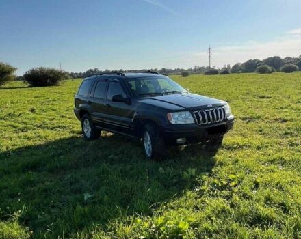 Черный Джип Гранд Чероки, объемом двигателя 0 л и пробегом 300 тыс. км за 7400 $, фото 1 на Automoto.ua