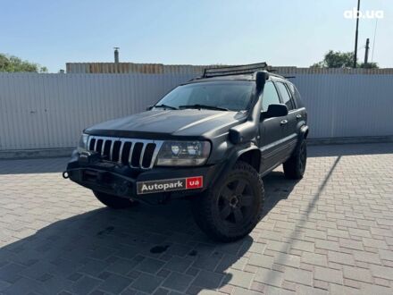 Джип Grand Cherokee 2002 у Запоріжжя на Automoto.ua Чорний Джип Grand Cherokee, об'ємом двигуна 4.7 л та пробігом 220 тис. км за 9690 $, фото 1 на Automoto.ua