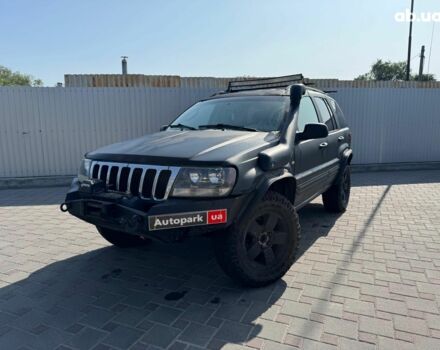 Чорний Джип Grand Cherokee, об'ємом двигуна 4.7 л та пробігом 220 тис. км за 9690 $, фото 1 на Automoto.ua