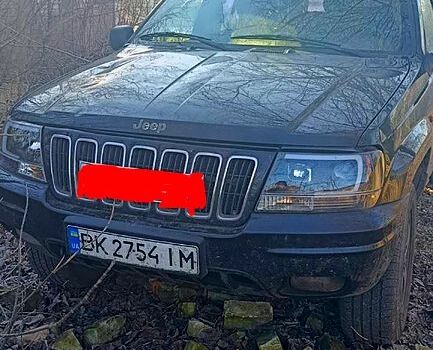 Черный Джип Гранд Чероки, объемом двигателя 2.7 л и пробегом 350 тыс. км за 5910 $, фото 1 на Automoto.ua