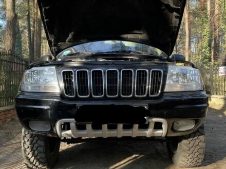 Джип Grand Cherokee 2002 у Сумах на Automoto.ua Чорний Джип Grand Cherokee, об'ємом двигуна 2.4 л та пробігом 270 тис. км за 10500 $, фото 1 на Automoto.ua