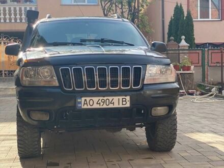 Чорний Джип Grand Cherokee, об'ємом двигуна 2.7 л та пробігом 400 тис. км за 8000 $, фото 1 на Automoto.ua