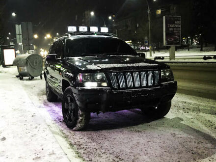 Чорний Джип Grand Cherokee, об'ємом двигуна 2.7 л та пробігом 240 тис. км за 10500 $, фото 1 на Automoto.ua