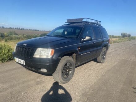 Джип Grand Cherokee 2003 у Чугуеве на Automoto.ua Чорний Джип Grand Cherokee, об'ємом двигуна 3.1 л та пробігом 300 тис. км за 4100 $, фото 1 на Automoto.ua