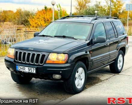 Джип Гранд Чероки 2003 в Новомосковске на Automoto.ua Черный Джип Гранд Чероки, объемом двигателя 3 л и пробегом 204 тыс. км за 3670 $, фото 1 на Automoto.ua