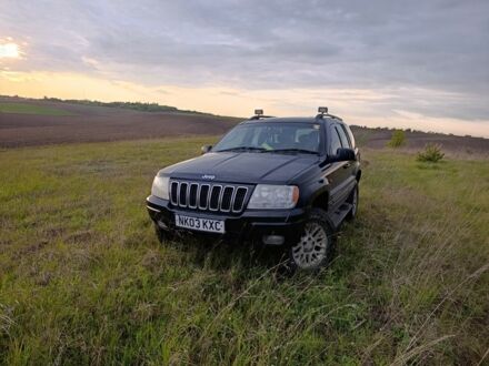 Джип Grand Cherokee 2003 у Рівному на Automoto.ua Чорний Джип Grand Cherokee, об'ємом двигуна 2.7 л та пробігом 290 тис. км за 4670 $, фото 1 на Automoto.ua
