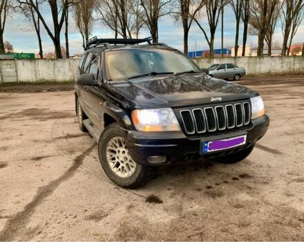 Черный Джип Гранд Чероки, объемом двигателя 2.7 л и пробегом 240 тыс. км за 5500 $, фото 1 на Automoto.ua