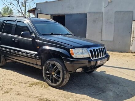 Чорний Джип Grand Cherokee, об'ємом двигуна 0 л та пробігом 240 тис. км за 5499 $, фото 1 на Automoto.ua