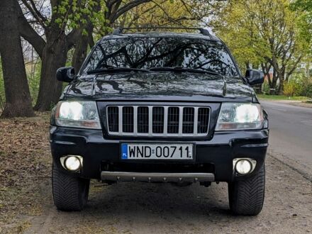 Чорний Джип Grand Cherokee, об'ємом двигуна 0 л та пробігом 246 тис. км за 7997 $, фото 1 на Automoto.ua