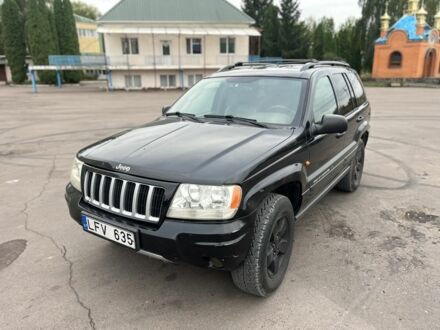 Черный Джип Гранд Чероки, объемом двигателя 2.7 л и пробегом 300 тыс. км за 4300 $, фото 1 на Automoto.ua