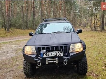 Черный Джип Гранд Чероки, объемом двигателя 0 л и пробегом 243 тыс. км за 4594 $, фото 1 на Automoto.ua