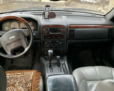 Черный Джип Гранд Чероки, объемом двигателя 2.7 л и пробегом 220 тыс. км за 6000 $, фото 1 на Automoto.ua