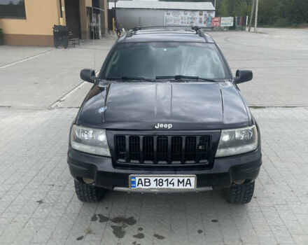 Чорний Джип Grand Cherokee, об'ємом двигуна 4 л та пробігом 125 тис. км за 7000 $, фото 1 на Automoto.ua