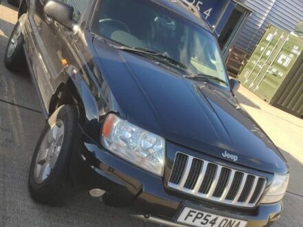Черный Джип Гранд Чероки, объемом двигателя 2.7 л и пробегом 250 тыс. км за 3600 $, фото 1 на Automoto.ua