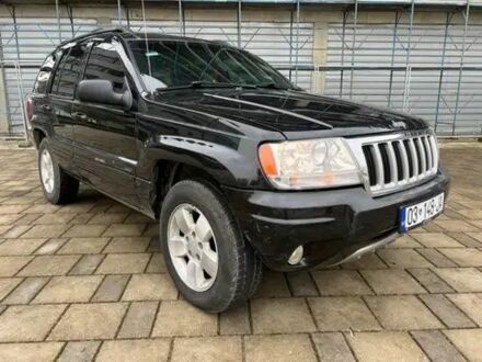Джип Grand Cherokee 2004 у Броварах на Automoto.ua Чорний Джип Grand Cherokee, об'ємом двигуна 2.7 л та пробігом 265 тис. км за 3200 $, фото 1 на Automoto.ua