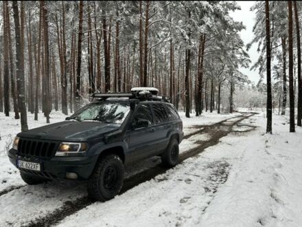 Черный Джип Гранд Чероки, объемом двигателя 2.7 л и пробегом 231 тыс. км за 3019 $, фото 1 на Automoto.ua