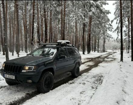 Черный Джип Гранд Чероки, объемом двигателя 2.7 л и пробегом 231 тыс. км за 3019 $, фото 1 на Automoto.ua