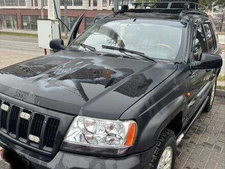 Черный Джип Гранд Чероки, объемом двигателя 2.7 л и пробегом 370 тыс. км за 6000 $, фото 1 на Automoto.ua