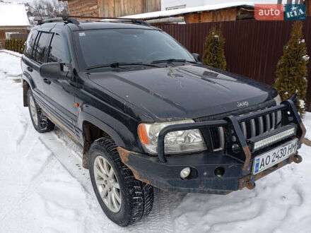 Джип Grand Cherokee 2004 у Рахове на Automoto.ua Чорний Джип Grand Cherokee, об'ємом двигуна 2.69 л та пробігом 340 тис. км за 6800 $, фото 1 на Automoto.ua