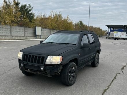 Джип Grand Cherokee 2004 у Харкові на Automoto.ua Чорний Джип Grand Cherokee, об'ємом двигуна 2.7 л та пробігом 259 тис. км за 3300 $, фото 1 на Automoto.ua
