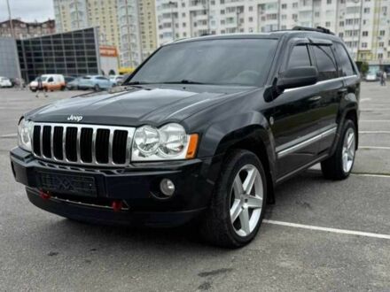 Чорний Джип Grand Cherokee, об'ємом двигуна 5.7 л та пробігом 194 тис. км за 10800 $, фото 1 на Automoto.ua