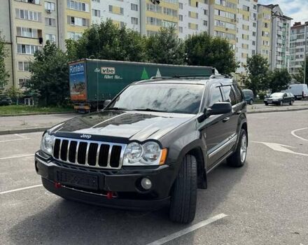 Черный Джип Гранд Чероки, объемом двигателя 5.7 л и пробегом 180 тыс. км за 12500 $, фото 1 на Automoto.ua