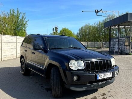 Джип Grand Cherokee 2006 у Луцьку на Automoto.ua Чорний Джип Grand Cherokee, об'ємом двигуна 3.7 л та пробігом 305 тис. км за 10500 $, фото 1 на Automoto.ua