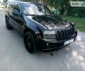 Чорний Джип Grand Cherokee, об'ємом двигуна 5.7 л та пробігом 165 тис. км за 12500 $, фото 1 на Automoto.ua