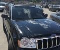 Чорний Джип Grand Cherokee, об'ємом двигуна 4.7 л та пробігом 200 тис. км за 12000 $, фото 1 на Automoto.ua