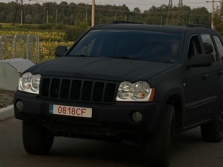 Чорний Джип Grand Cherokee, об'ємом двигуна 3 л та пробігом 310 тис. км за 10000 $, фото 1 на Automoto.ua