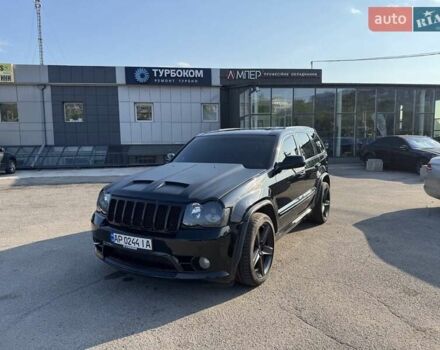 Чорний Джип Grand Cherokee, об'ємом двигуна 6.06 л та пробігом 129 тис. км за 27000 $, фото 1 на Automoto.ua