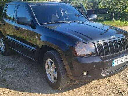 Чорний Джип Grand Cherokee, об'ємом двигуна 5.7 л та пробігом 300 тис. км за 13700 $, фото 1 на Automoto.ua