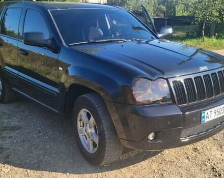 Чорний Джип Grand Cherokee, об'ємом двигуна 5.7 л та пробігом 300 тис. км за 13700 $, фото 1 на Automoto.ua