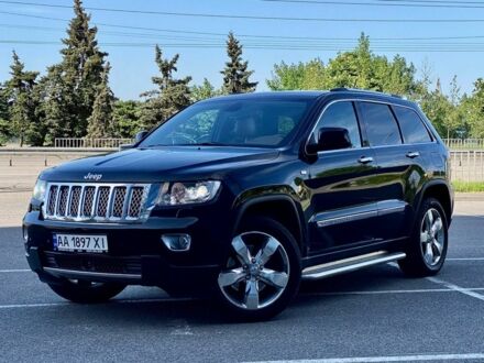 Чорний Джип Grand Cherokee, об'ємом двигуна 3 л та пробігом 200 тис. км за 18400 $, фото 1 на Automoto.ua