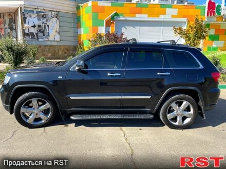 Чорний Джип Grand Cherokee, об'ємом двигуна 3 л та пробігом 114 тис. км за 21000 $, фото 1 на Automoto.ua